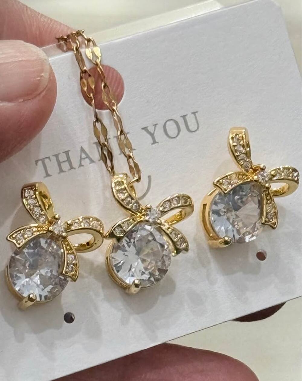 Gold Tone Fashion CZ Bow Jewelry Set – Earrings, Pendant & Chain